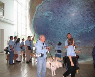 Way Fun group at Delorme, pointing the worlds largest rotating globe