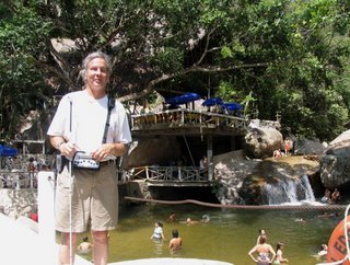 Mike on the bridge overlooking a large pool