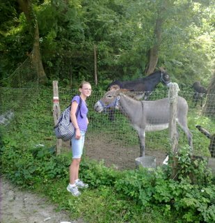 Colleen next to the burros