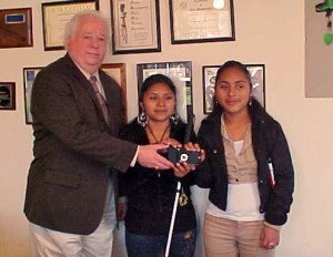 a KNFB reader being awarded to two students at the California School for the Blind