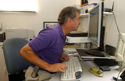 Mike looking at the computer screen