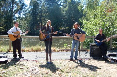 Mark Babin, Sara Beck, Park Chisolm, and Felix Bannon playing music