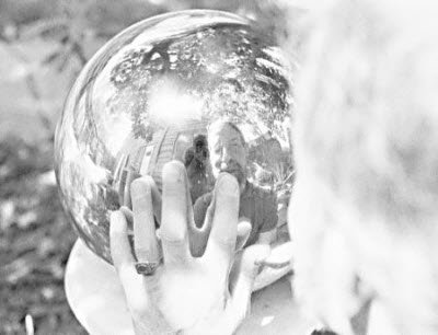 Mike gazing into a reflective ball